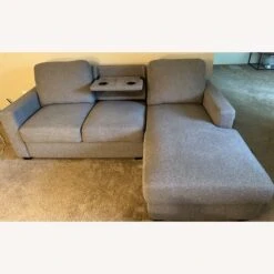 Grey Couch With Drop Down Table