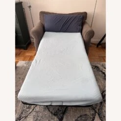 Ashley Furniture Nesso Convertible Loveseat / Bed -Home Furnishings Store 1500 1500 frame 0 911